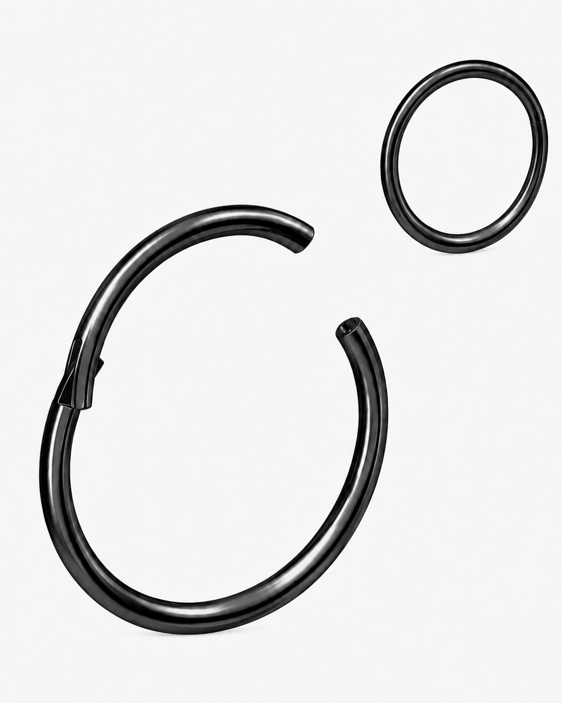 Piercing clicker negro de acero inoxidable abierto mostrando el cierre